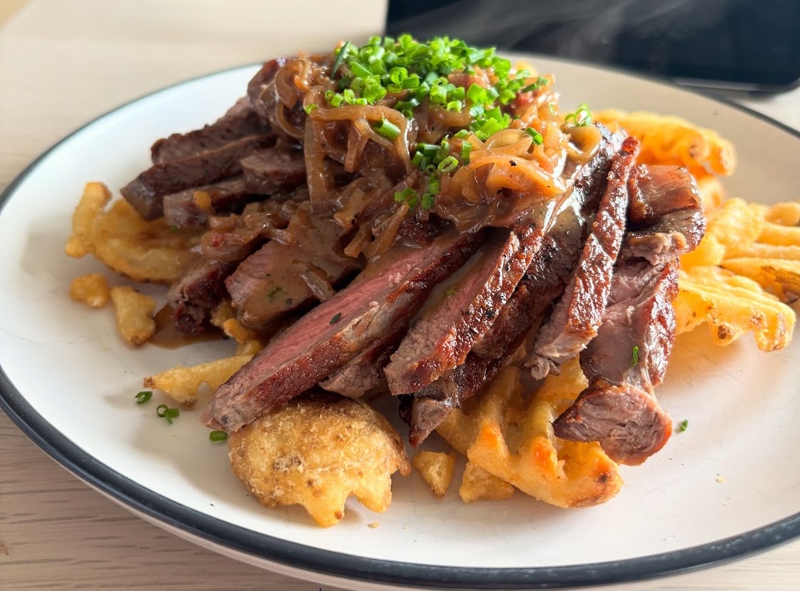 Steak with Waffle Fries and Caramelized Onions